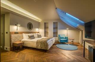 Отель Hotel Vilnia Вильнюс Улучшенный двухместный номер с 1 кроватью или 2 отдельными кроватями-1